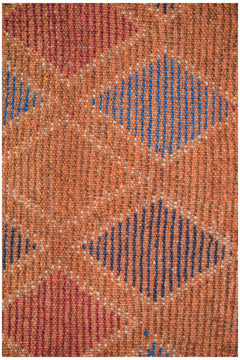 Afghan Pashm Rug with diamond pattern in blue and red on an orange background.