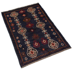 A handmade Afghan Pashm rug featuring geometric patterns in dark blue, red, and ivory tones.