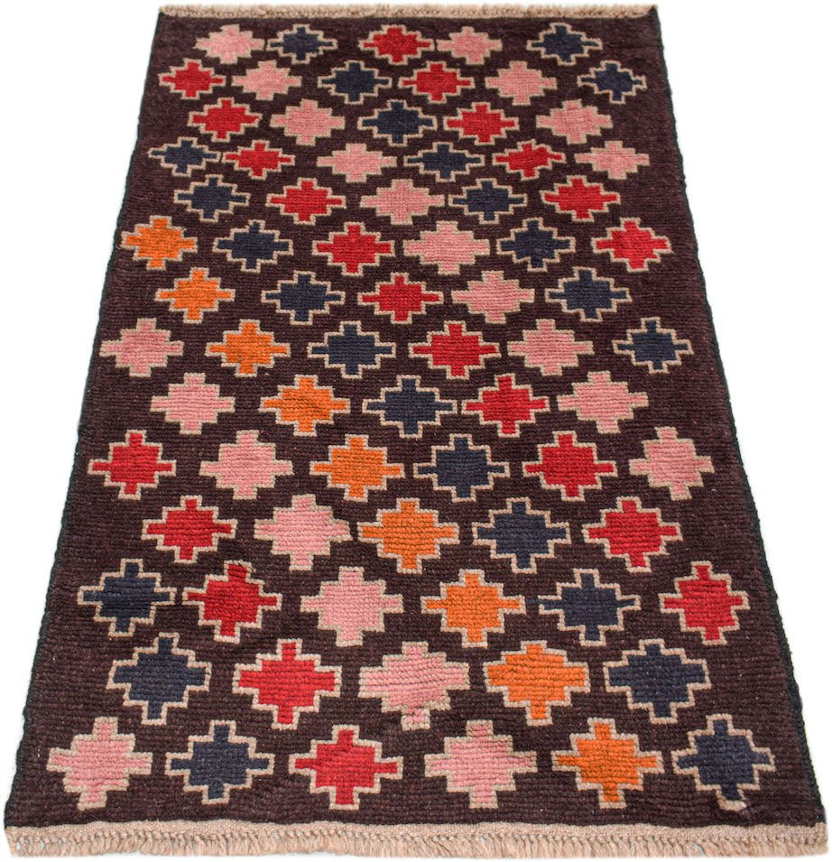 Handmade Afghan Pashm rug featuring a dark brown background with a repeating geometric cross pattern.