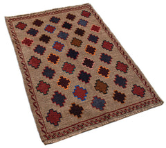 Handmade Afghan Pashm rug featuring a repeating geometric pattern in earthy tones on a tan field.