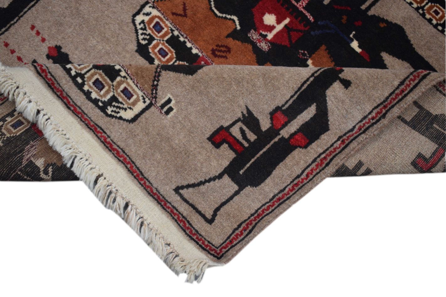 A handmade Afghan wool rug featuring geometric patterns and war-themed motifs on a tan background.