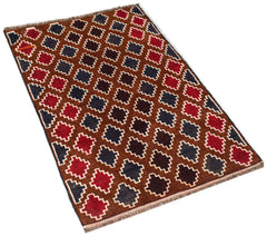 Handmade Afghan Pashm rug featuring a repeating geometric pattern in dark red, brown, and blue.