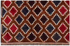 Handmade Afghan Pashm rug featuring a repeating geometric pattern in dark red, brown, and blue.