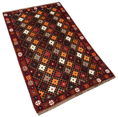 Afghan Pashm rug with a geometric floral pattern in various colors.