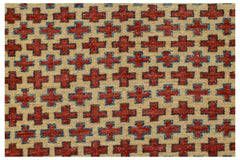 A handmade Afghan Pashm rug featuring a repeating pattern of red crosses on an ivory background.