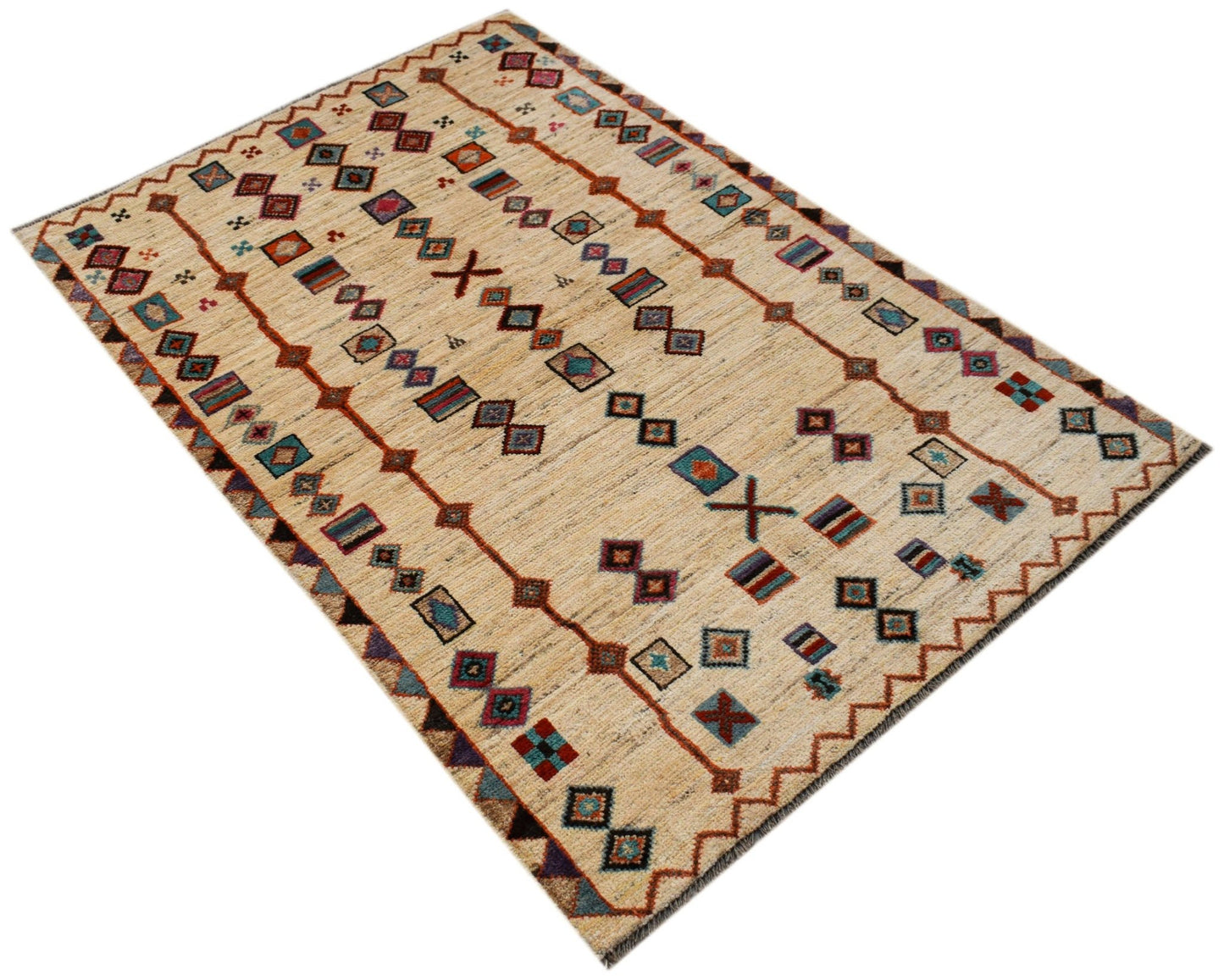 An Afghan Pashm rug featuring a beige field with geometric patterns and linear borders.