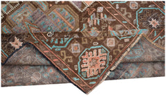 A handmade Afghan Pashm rug featuring traditional tribal geometric patterns in brown and blue.