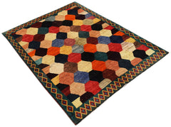Hand-knotted Afghan wool rug featuring a colorful geometric honeycomb pattern and a bordered edge.