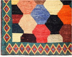 Hand-knotted Afghan wool rug featuring a colorful geometric hexagon pattern and a diamond border.