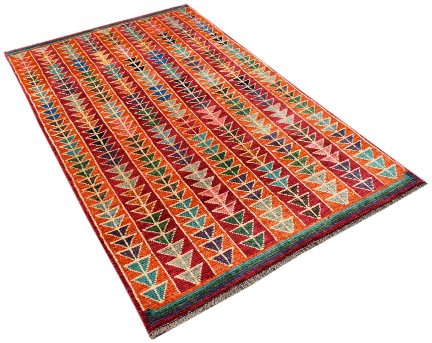 Hand-knotted Afghan wool rug featuring a vibrant geometric pattern of colorful triangles.
