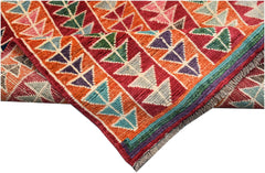 Hand-knotted Afghan wool rug featuring a vibrant geometric pattern of colorful triangular motifs.
