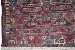 Handmade Afghan wool rug featuring a dark brown field with woven tank and military motifs.