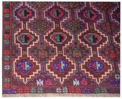 Handmade Afghan Pashm rug featuring a geometric diamond pattern in dark red, blue, and brown.