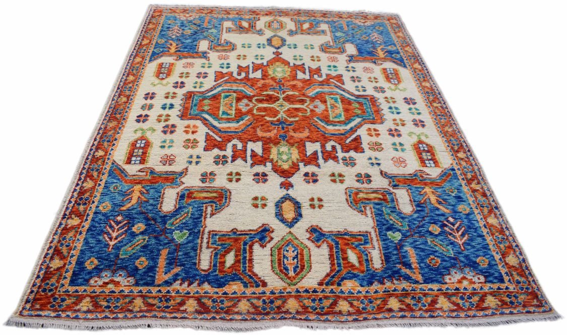 Handmade Afghan Pashm wool rug featuring a tribal geometric pattern in blue, orange, and cream.