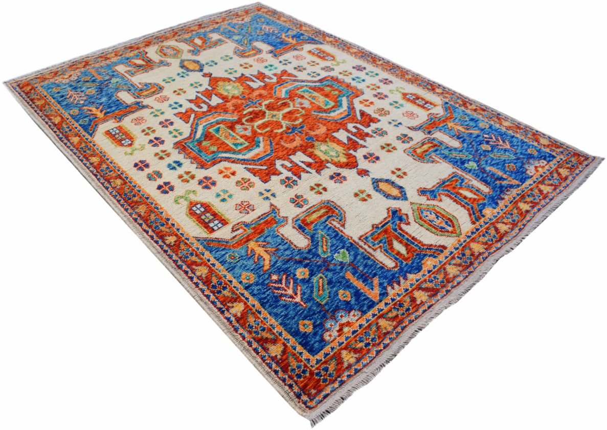 Handmade Afghan Pashm rug featuring a vibrant geometric tribal pattern in blue, orange, and cream.
