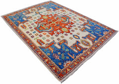 Handmade Afghan Pashm rug featuring a vibrant geometric tribal pattern in blue, orange, and cream.