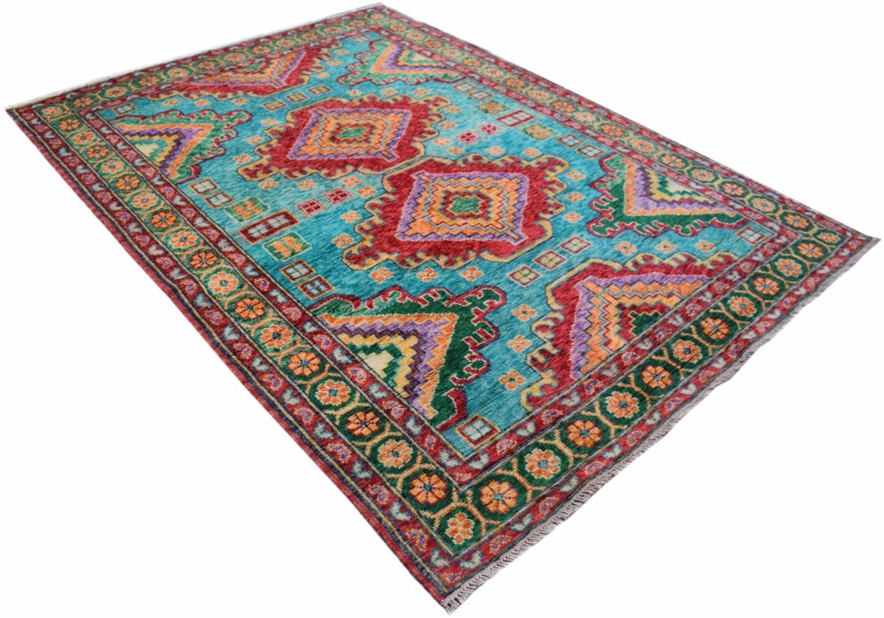 A handmade Afghan wool rug featuring a vibrant geometric pattern in red, green, and orange.