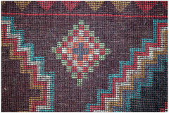 A handmade Afghan Pashm rug featuring a dark brown field with geometric diamond and zigzag patterns.
