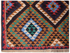 Handmade Afghan Pashm rug featuring a geometric diamond pattern in shades of red, blue, and brown.
