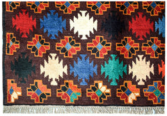 Handmade Afghan Pashm rug featuring a dark brown field with colorful geometric tribal motifs.