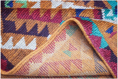Afghan Pashm rug with geometric patterns in red, brown, and blue.