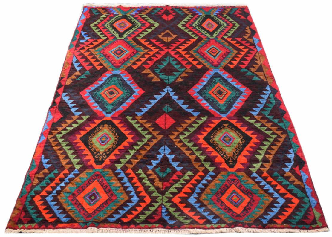 Handmade Afghan Pashm rug featuring a vibrant geometric diamond pattern in wool.