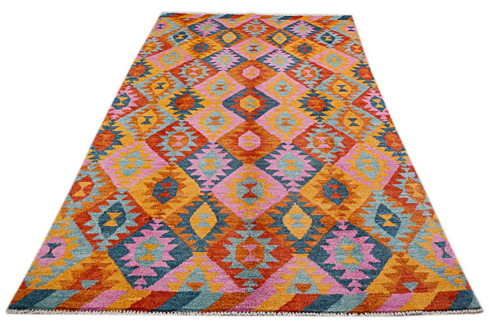 Handmade Afghan wool rug featuring a colorful geometric diamond pattern in warm tones.