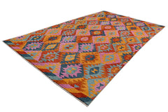 Handmade Afghan Pashm rug featuring a vibrant geometric diamond pattern in wool.