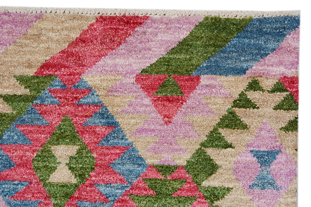 Handmade Afghan wool rug featuring a vibrant geometric pattern in pink, green, blue, and tan.