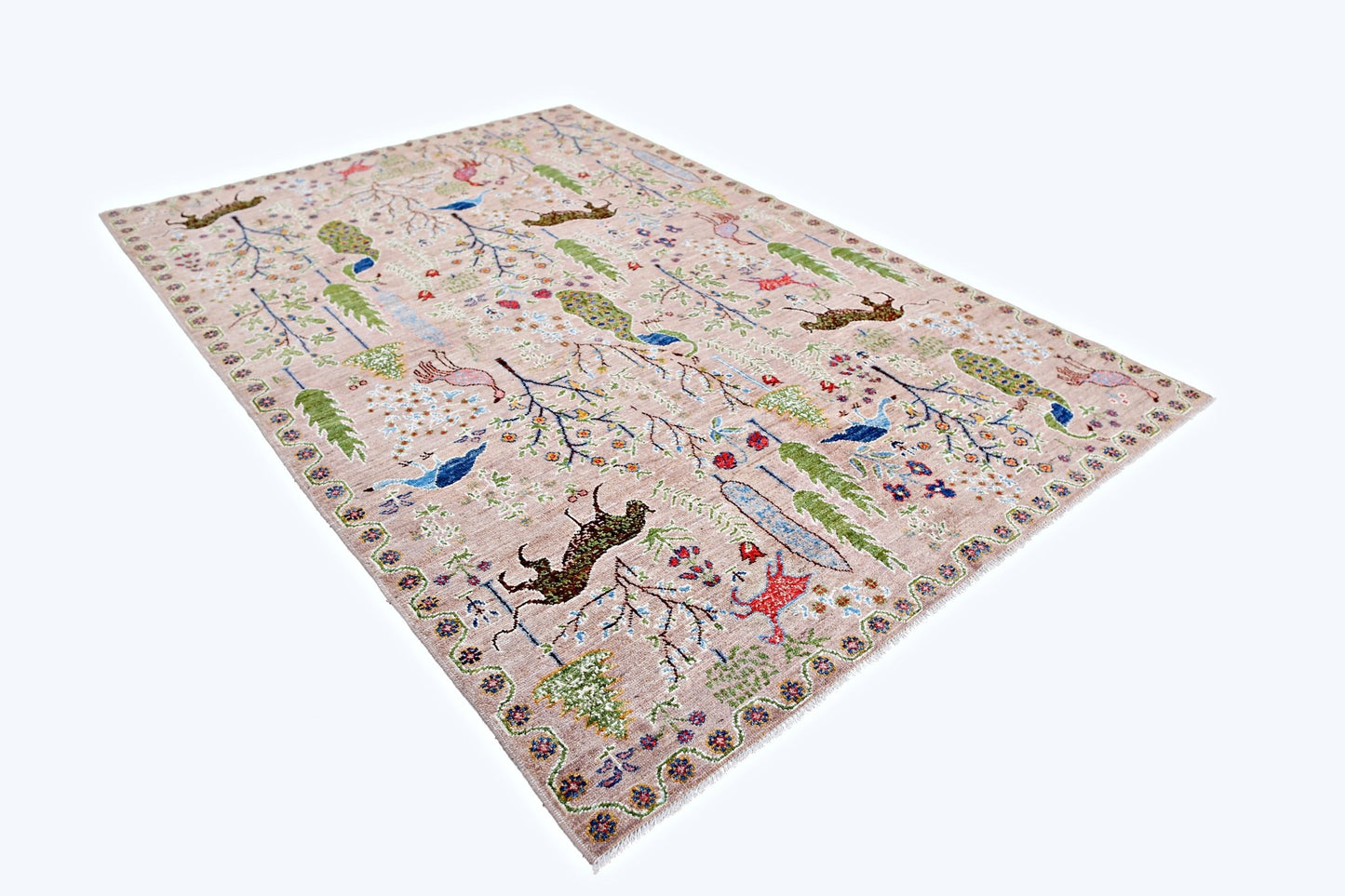 Handmade Afghan Pashm rug featuring a light pink field with intricate animal and floral motifs.