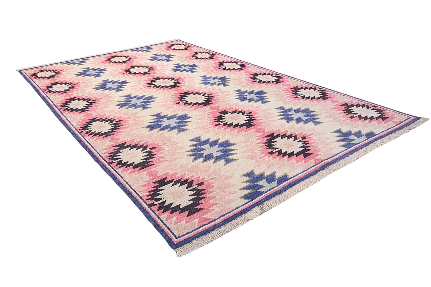 A handmade Afghan wool rug featuring a repeating geometric pattern in pink, blue, and cream.