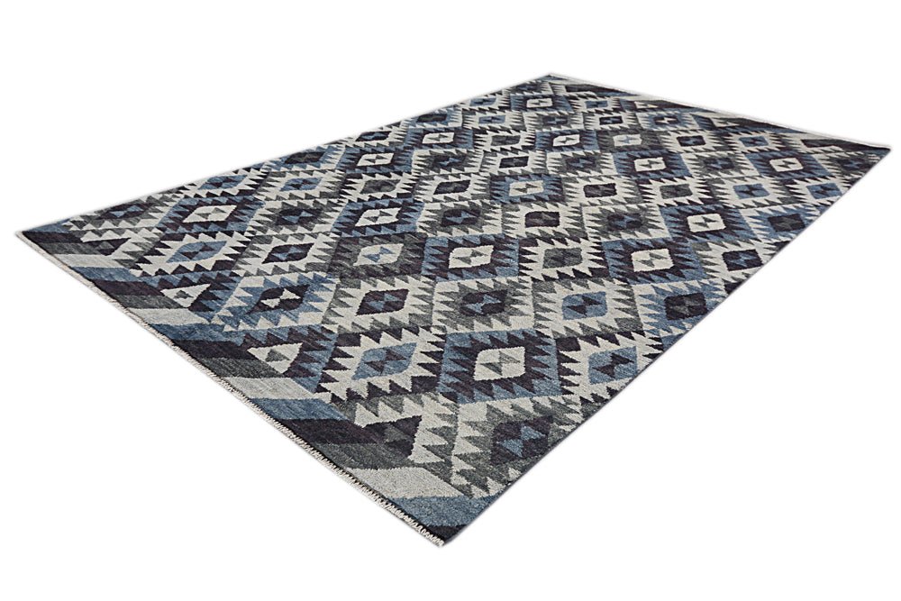 Handmade Afghan Pashm rug featuring a geometric diamond pattern in shades of blue, grey, and white.