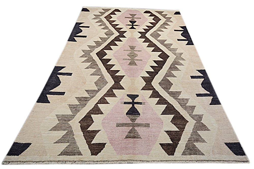 Handmade Afghan Pashm rug featuring a geometric kilim pattern in pink, brown, and cream wool.