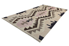 Handmade Afghan Pashm rug featuring a geometric kilim pattern in shades of pink, brown, and cream.