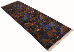 A handmade Afghan wool runner rug featuring a traditional hunting scene with deer on a dark blue background.