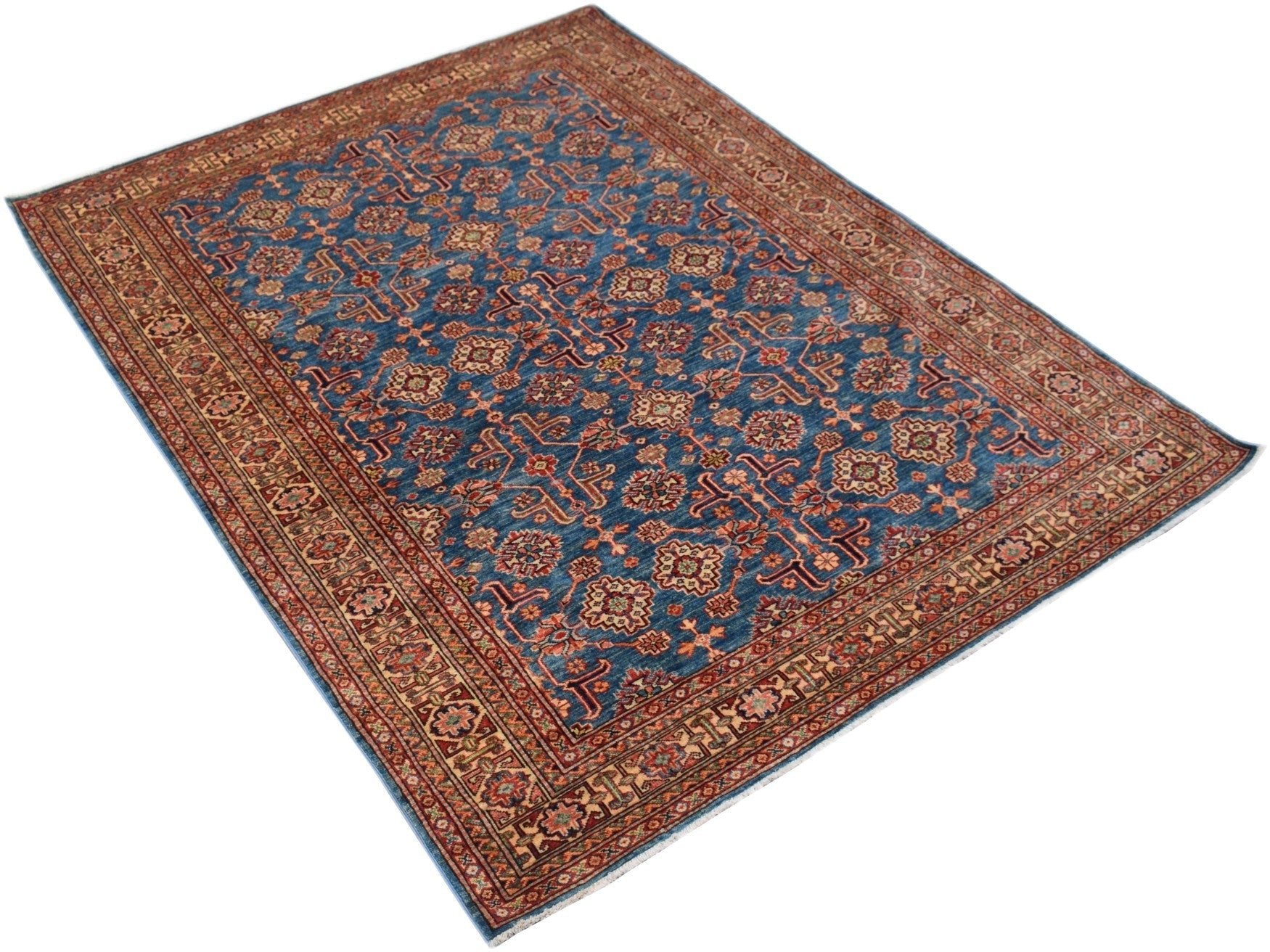 Handmade Afghan Super Kazakh rug featuring a blue field with traditional geometric patterns.
