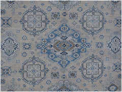 Handmade Afghan Super Kazakh rug featuring traditional blue and beige geometric medallion patterns.