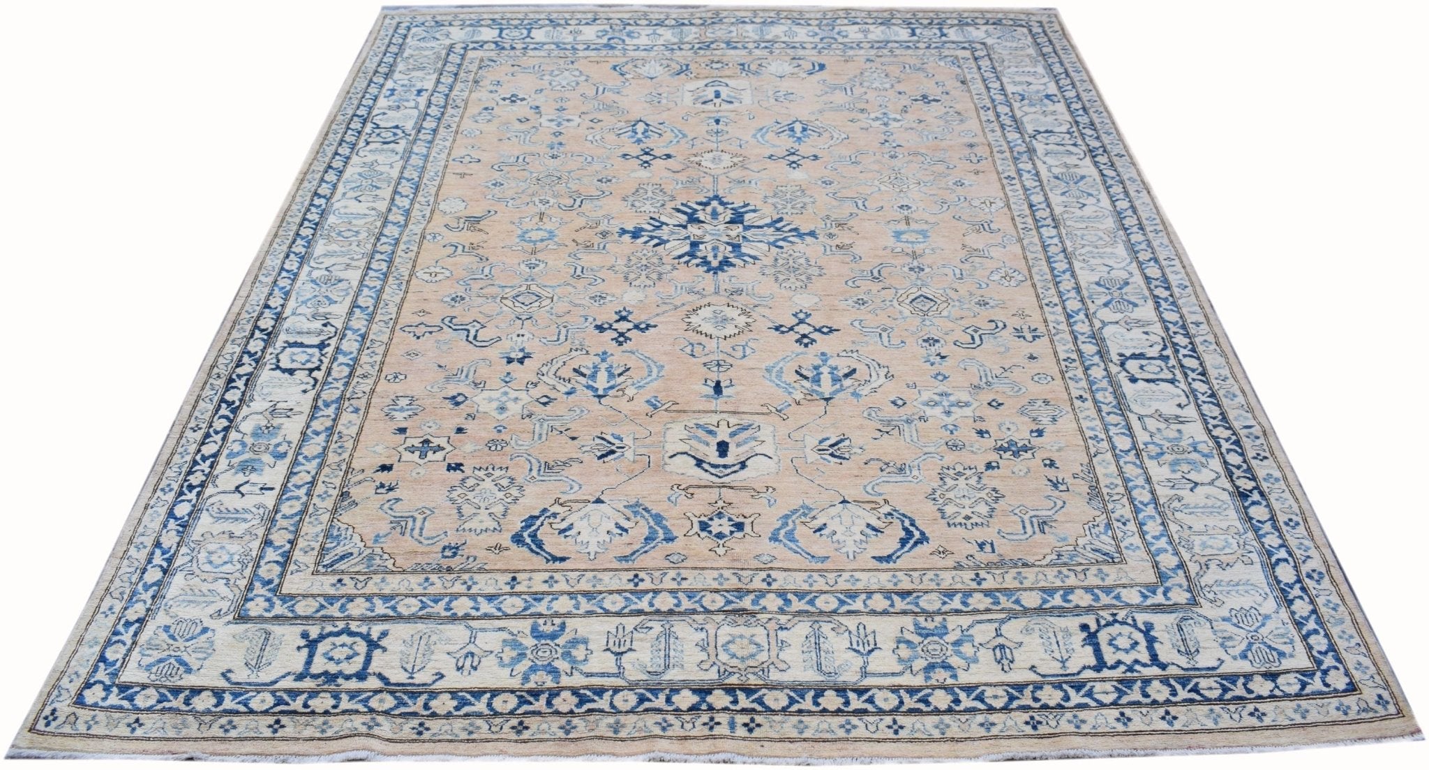 Handmade Afghan Super Kazakh rug featuring a beige field with intricate blue geometric patterns.