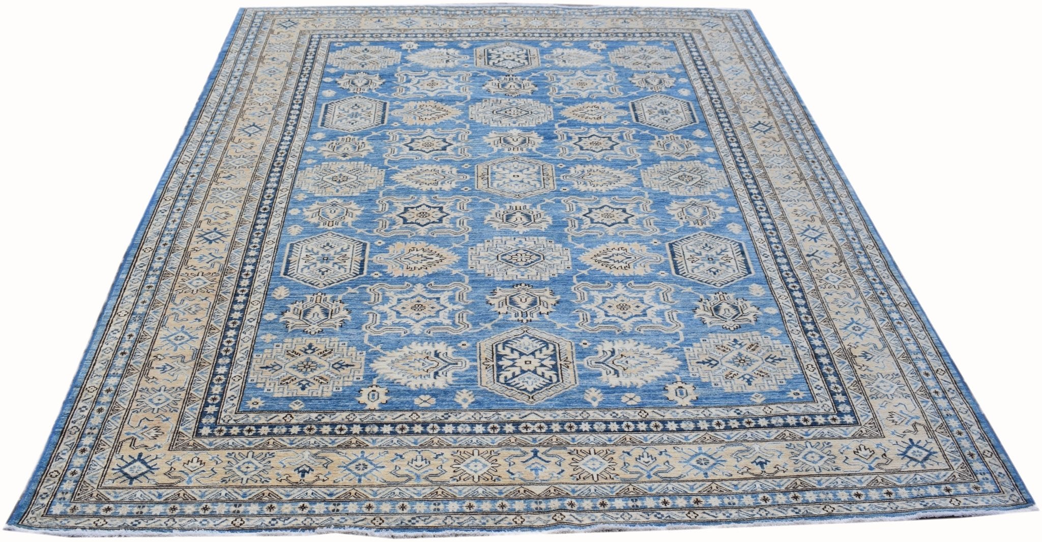 A handmade Afghan Super Kazakh rug featuring traditional geometric motifs in blue and cream.