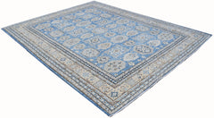 A handmade Afghan Super Kazakh rug featuring traditional geometric motifs in blue and cream tones.