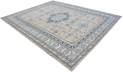 A handmade Afghan Super Kazakh rug featuring traditional blue geometric motifs on a beige field.