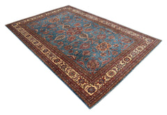 A handmade Afghan Super Kazakh rug featuring traditional geometric motifs in blue, red, and cream.