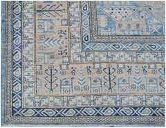 A handmade Afghan Super Kazakh rug featuring traditional blue and beige geometric motifs.