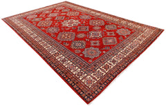 A handmade Afghan Super Kazakh rug featuring traditional geometric motifs on a vibrant red field.