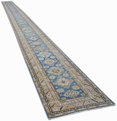 A long, handmade Afghan Super Kazakh runner rug featuring traditional geometric motifs in blue.