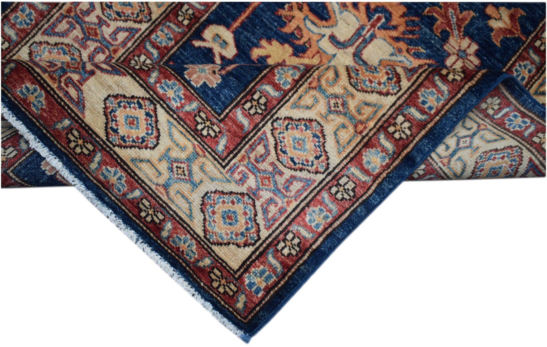 An Afghan Super Kazakh runner rug featuring a traditional geometric pattern in blue and red.