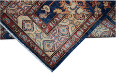 An Afghan Super Kazakh runner rug featuring a traditional geometric pattern in blue and red.