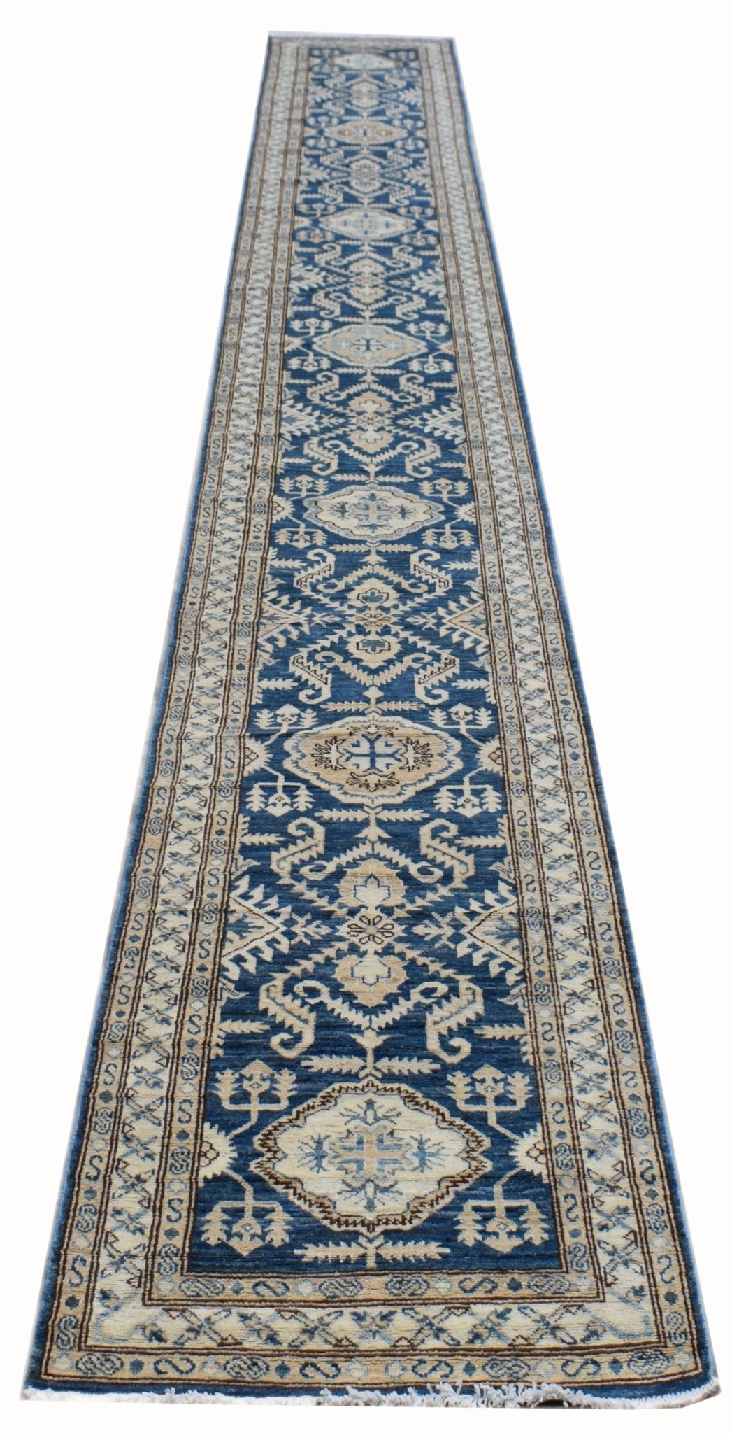A long, handmade Afghan Super Kazakh runner rug featuring traditional blue and beige geometric motifs.
