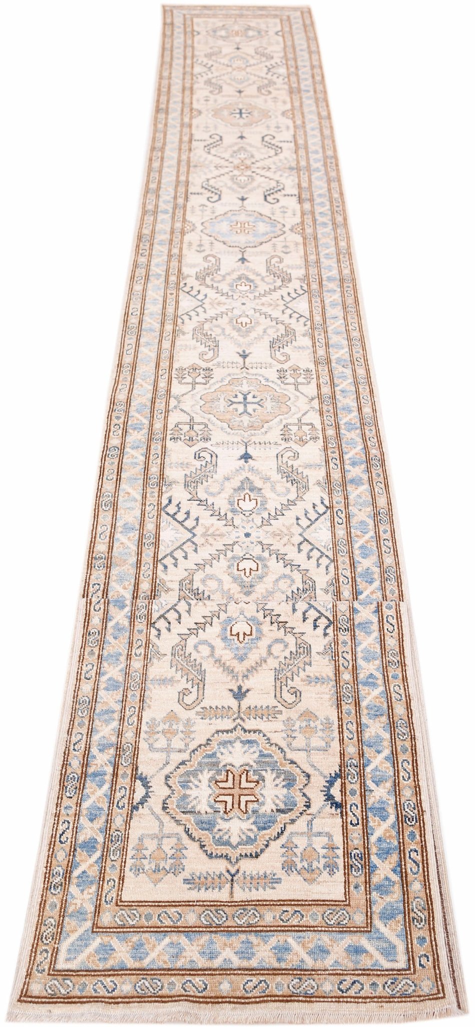 A long, handmade Afghan Super Kazakh runner rug featuring traditional geometric motifs in blue and tan.