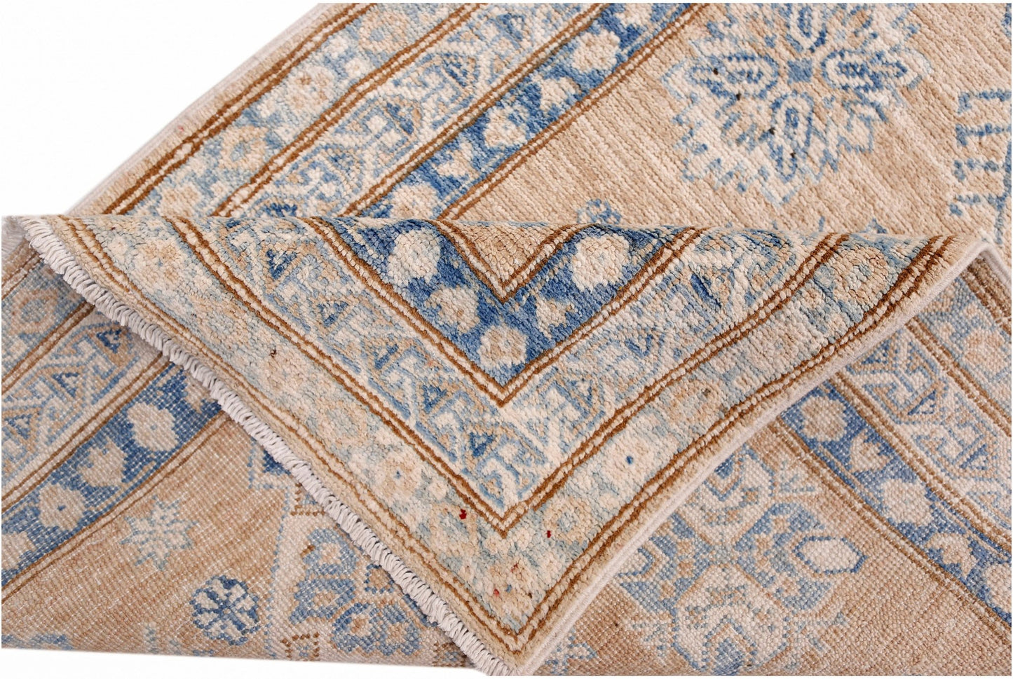 A handmade Afghan Super Kazakh runner featuring traditional blue and beige geometric patterns.